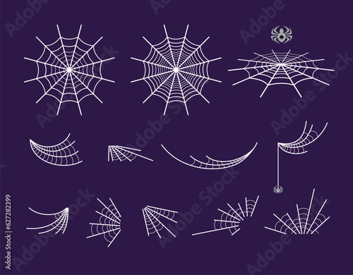 Spider web set isolated on dark background. Spider web silhouette hanging for Halloween banner decorations.  Horror creepy cartoon art concept for Halloween party. 