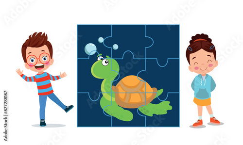 happy cute little kid play jigsaw puzzle