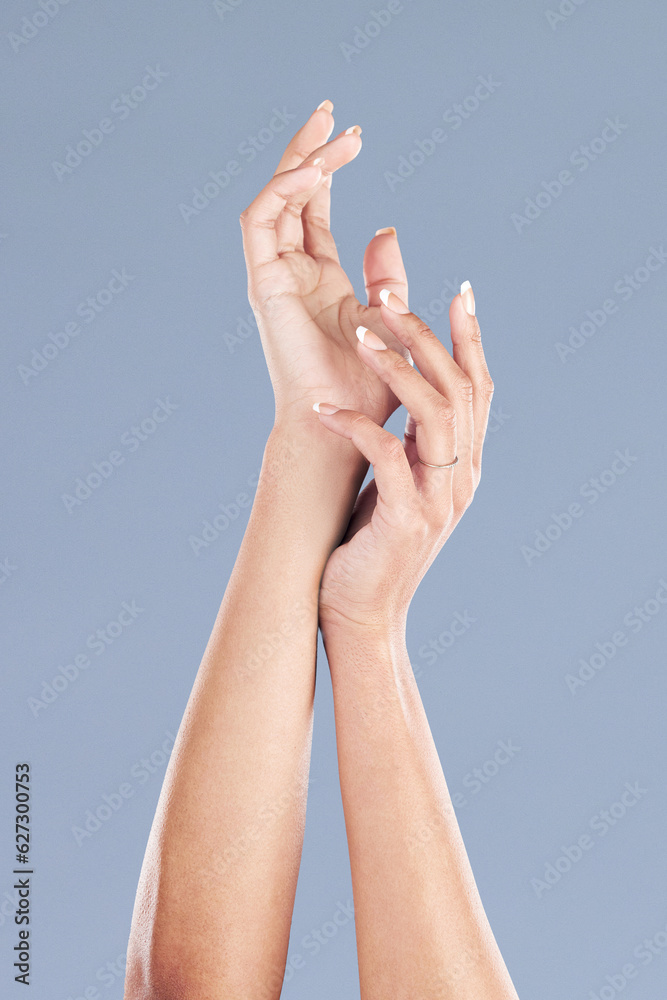 Hands, nails and manicure with woman and beauty, skincare and dermatology isolated on grey background. Natural cosmetics, wellness and self care, female model and bodycare with skin glow in studio Hands, nails and manicure with woman and beauty, skincare and dermatology isolated on grey background. Natural cosmetics, wellness and self care, female model and bodycare with skin glow in studio