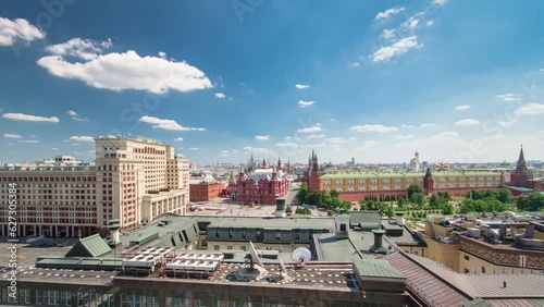 Panorama of Manezh Square, Hotel Moscow, historical Museum and Kremlin aerial timelapse at cloudy summer day from rooftop in Moscow, Russia.