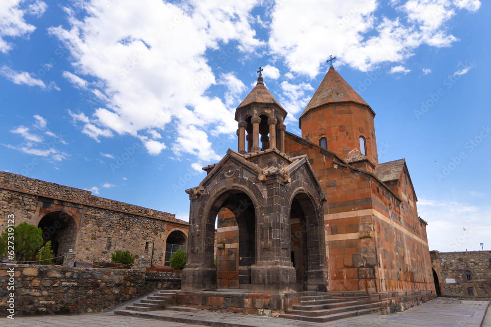 Khor Virap Monastery in Armenia on the background of blue sky with clouds, view inside the courtyard