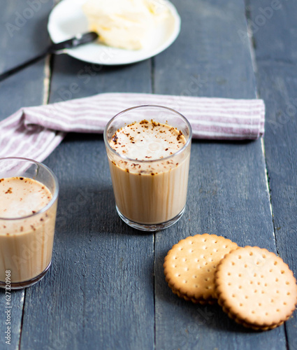 Cocoa in a glass with two cookies