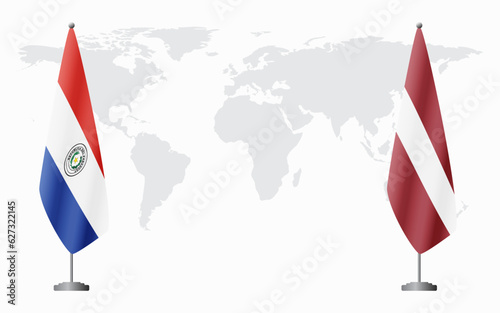 Paraguay and Latvia flags for official meeting