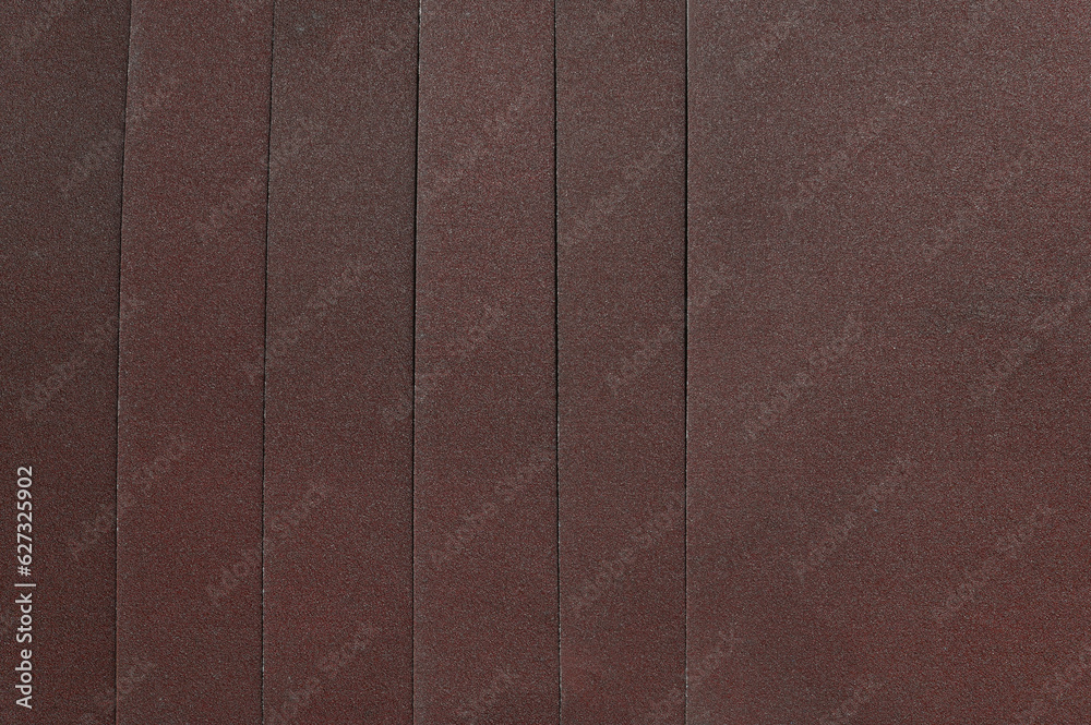 Fototapeta premium The background is made of sandpaper sheets. View from above.