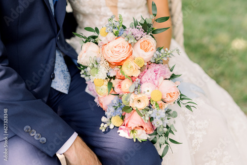 bride and groom holding hands