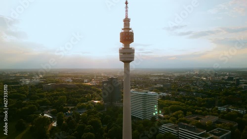 Aerial footage cityscape Florianturm or Florian Tower telecommunications tower and Westfalenpark in Dortmund, Germany photo