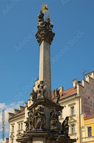 Detailed view of medieval Plague Column in historic center of Loket town, Bohemia, Sokolov, Karlovarsky Region, Czech Republic. Travel and tourism concept