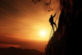 silhouette of man climbing to success 