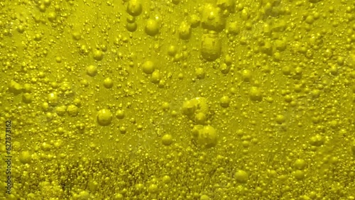 Wallpaper Mural Transparent Cosmetic Gel Fluid With Molecule Bubbles Flowing On The Plain Surface. Lots of air bubbles in the yellow gel.  Torontodigital.ca