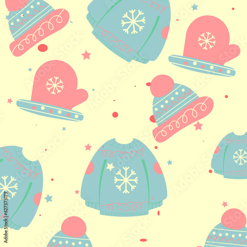 A pattern picture at winter wear theme  more specifially  winter sweaters  hats and gloves on a light yellow background