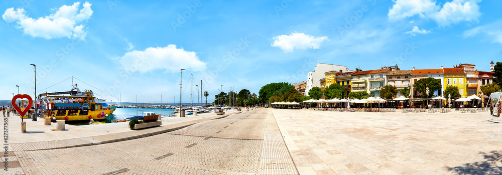 Panorama Of The Scenic Promenade With Ships And Restaurants In panorama-of-the-scenic-promenade-with-ships-and-restaurants-in