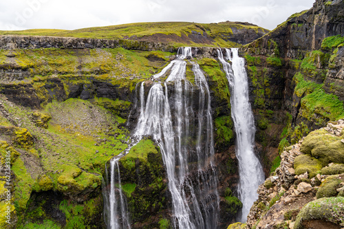 Fototapeta Naklejka Na Ścianę i Meble -  Glymur waterfall in Iceland, as it cascades down into the canyon
