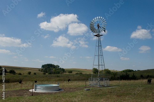 Windmill and tank system for watering cattle; Valparaiso, Nebraska, United States of America photo