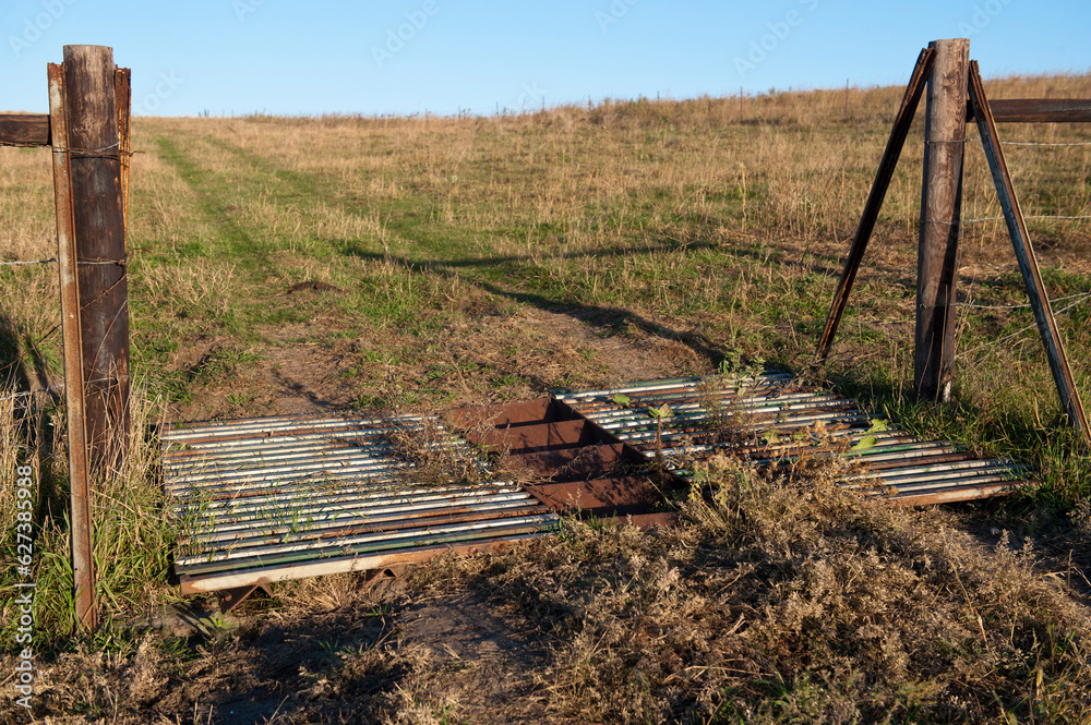 Cattle gate on a farm; Valparaiso, Nebraska, United States of America Cattle gate on a farm; Valparaiso, Nebraska, United States of America