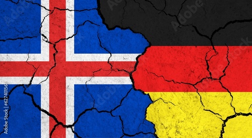 Flags of Iceland and Germany on cracked surface - politics, relationship concept