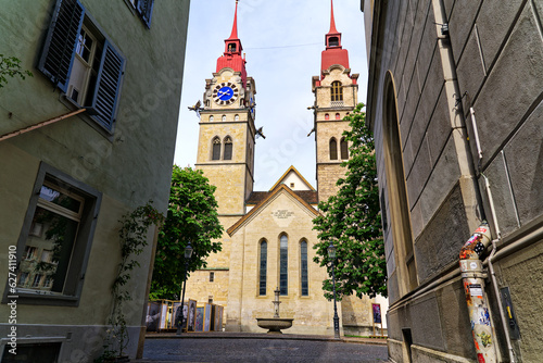 Scenic view of medieval protestant church at the old town of Swiss City of Winterthur on a blue cloudy spring day. Photo taken May 17th, 2023, Winterthur, Switzerland.