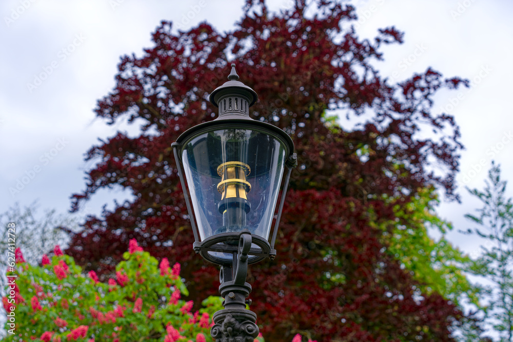 Close-up of black lantern at public park at Swiss City of Winterthur on a cloudy spring day. Photo taken May 17th, 2023, Winterthur, Switzerland.