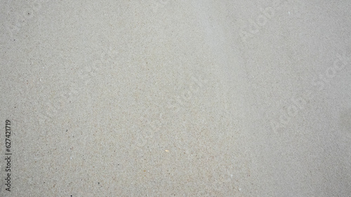 Coarse beach sand texture for background