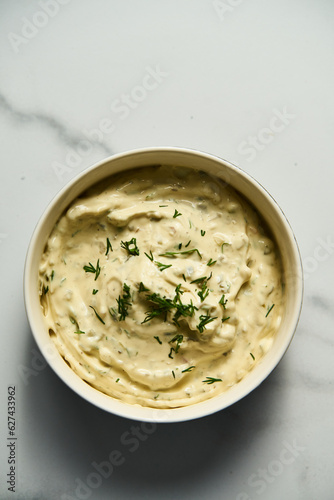 Classic Tartar Sauce dip in the bowl. Mayonnaise with dill and capers plus lemon, shallot onion. Worcester sauce and Dijon Mustard. 