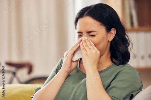 Konstfotografi Sick, allergy and blowing nose with woman on sofa for virus, hayfever or illness