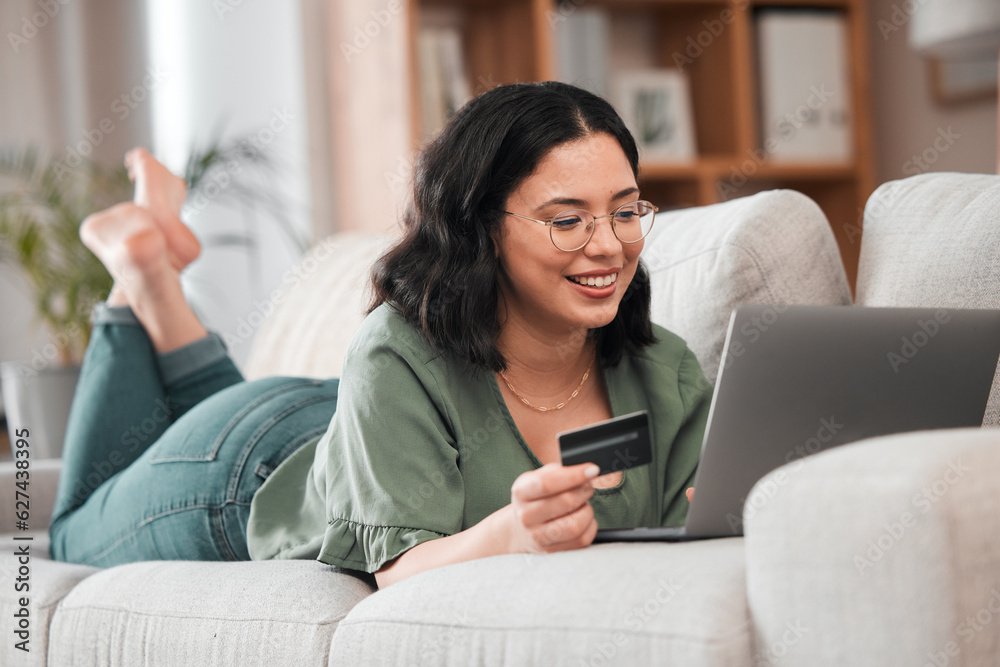 Credit card, computer and woman for home online shopping, e learning and fintech payment on sofa. Relax, student loan and person on laptop banking, study subscription or website transaction on couch Credit card, computer and woman for home online shopping, e learning and fintech payment on sofa. Relax, student loan and person on laptop banking, study subscription or website transaction on couch