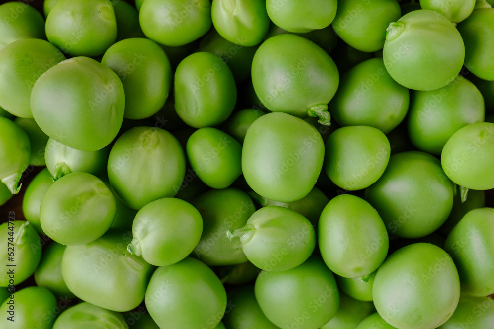 Green Pea. Green background. Peas background. Top view. Closeup. Macro shot of fresh pea. Green Pea. Green background. Peas background. Top view. Closeup. Macro shot of fresh pea.