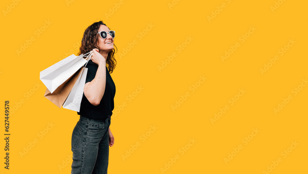 Young Woman with Shopping Bags - Embracing the Joy of Buying.