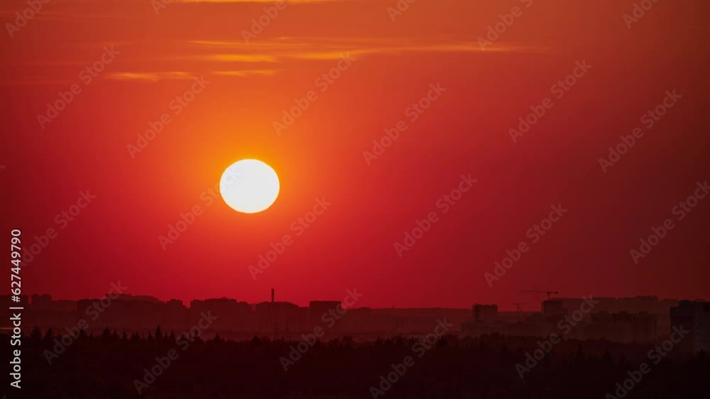 The silhouette of the trees against the red sunset was stunning, timelapse The silhouette of the trees against the red sunset was stunning, timelapse
