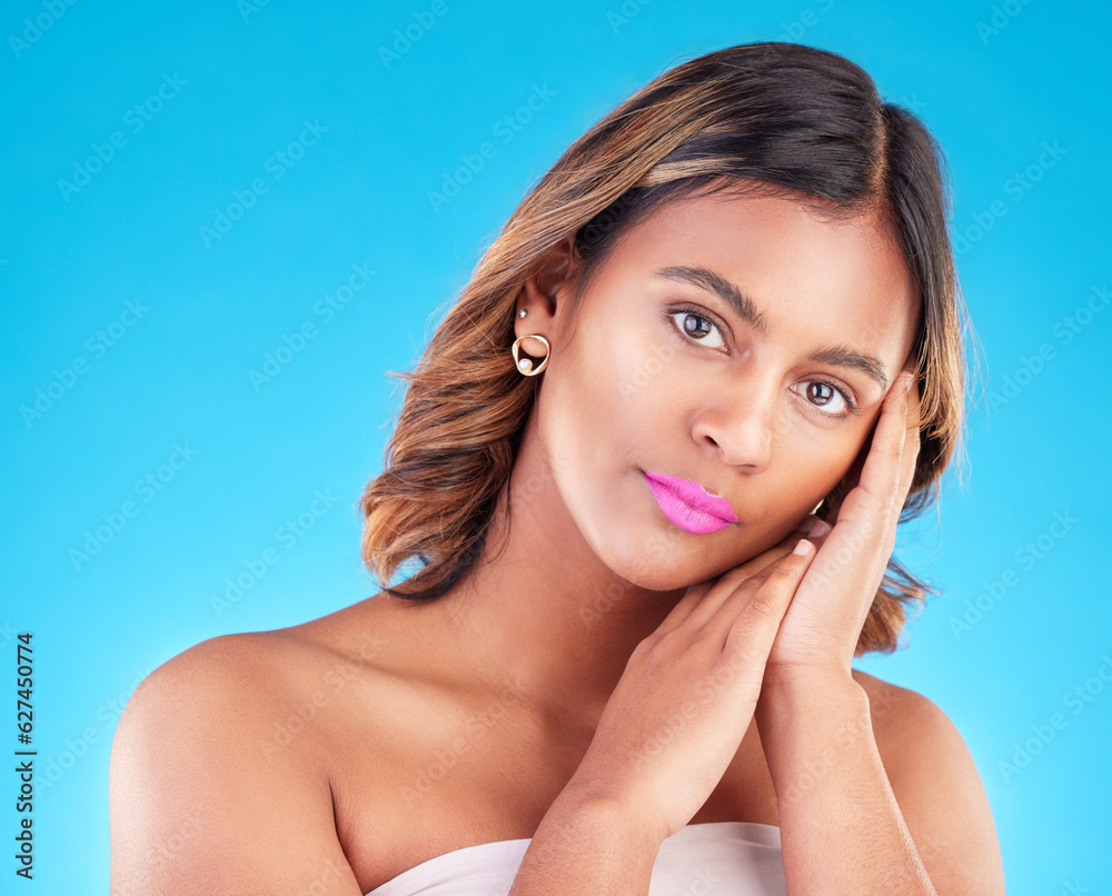 Woman, face and beauty and pink lipstick, skincare and makeup with cosmetics on blue background. Color, bold and wellness with self care, healthy skin glow and dermatology, female model in a studio Woman, face and beauty and pink lipstick, skincare and makeup with cosmetics on blue background. Color, bold and wellness with self care, healthy skin glow and dermatology, female model in a studio