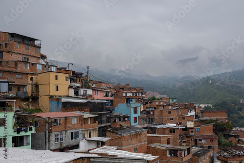 Fotografie Aerial panoramic view of poor neighborhoods and favelas built of red brick in city's outskirt