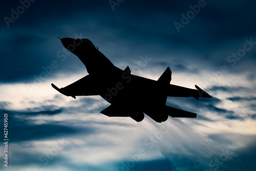 Fototapeta Military fighter jet plane at air base