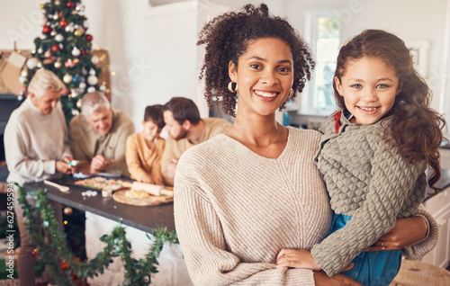 Christmas  portrait and mother with girl  happy together and bonding in home. Xmas  smile and face of kid with African mom  interracial and adoption at family party  celebration and winter holiday