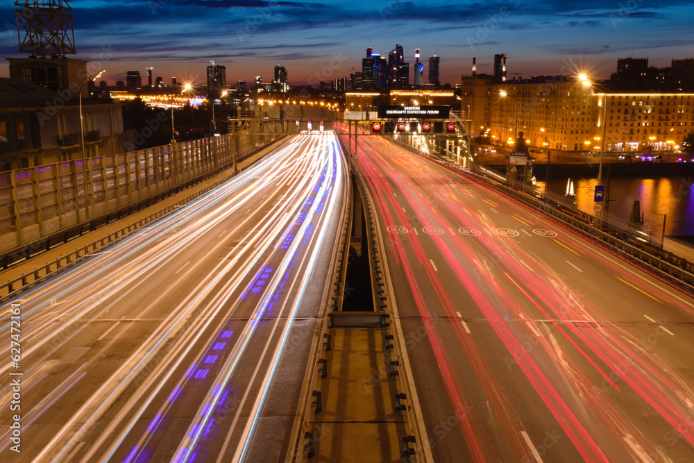 Evening view on the Andreevsky Bridge. Moscow evening road traffic.