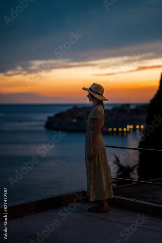 Beautiful female model on the streets of old town dubrovnik. Beautiful sunset.