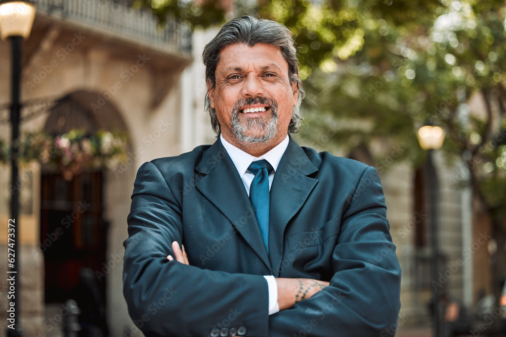 Senior man, executive with arms crossed and smile in portrait outdoor, career success and pride in business. Professional mindset, male CEO and confidence, happy in city with company vision and goals Senior man, executive with arms crossed and smile in portrait outdoor, career success and pride in business. Professional mindset, male CEO and confidence, happy in city with company vision and goals