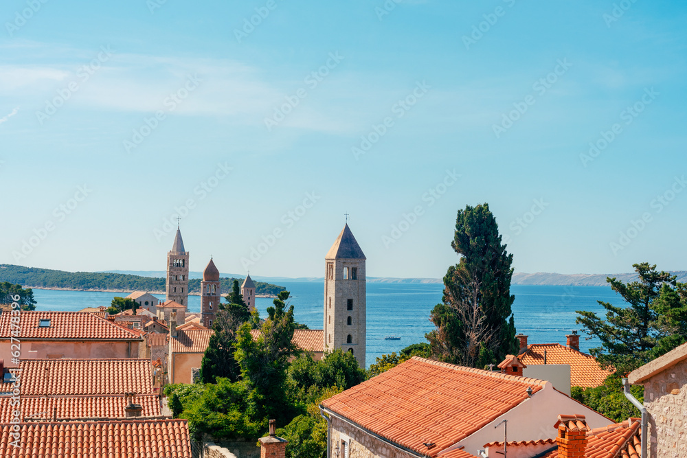 Fototapeta premium Skyline of the beautiful town of Rab with its towers. Rab island, Croatia