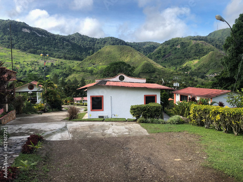 landscape of an inn in Caripe, Monagas State, landscape of a mountainous town. A look at colonial houses during a sunny day with a mountain in the background © manuel