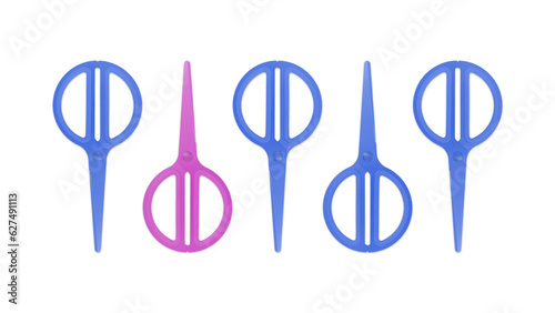 Group top view of blue and pink hand scissors with round handles on white background.