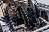The car after the fire. Iron parts of a burnt car. Abandoned burnt-out car, due to a short circuit, arson.ready for scrapping