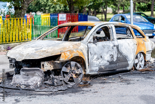 The car after the fire. Iron parts of a burnt car. Abandoned burnt-out car, due to a short circuit, arson.ready for scrapping