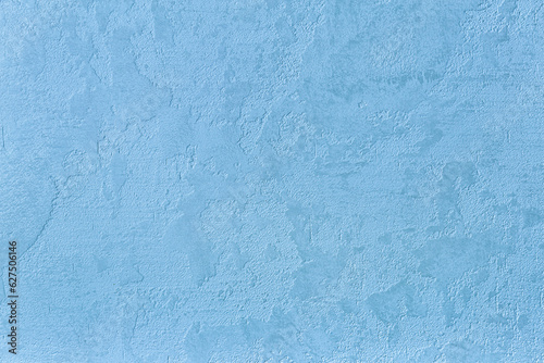 Texture of natural travertine for walls and floor, blue abstract relief background of stone polished surface.