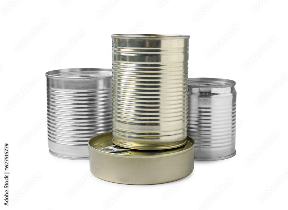 Many closed tin cans isolated on white Many closed tin cans isolated on white