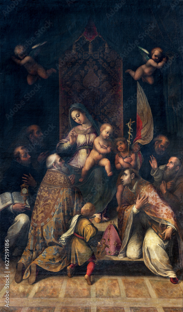 NAPLES, ITALY - APRIL 21, 2023: The painting of Madonna among the saints in the church Basilica della Santissima Annunziata Maggiore by unknown artist.
