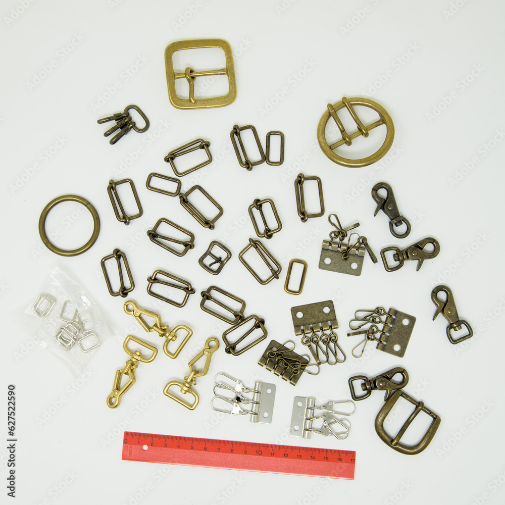 Obraz premium A collection of metal fittings used for leather products