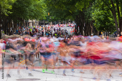 Motion blur of thousands running in Atlanta Peachtree Road Race