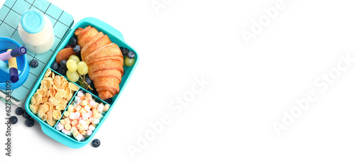 Lunchbox with tasty food, bottle of milk and school stationery on white background with space for text