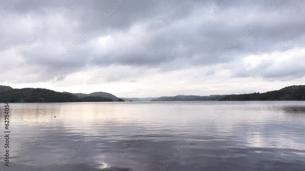 Flying Over Farris Lake On A Cloudy Day In Norway - aerial drone shot Flying Over Farris Lake On A Cloudy Day In Norway - aerial drone shot