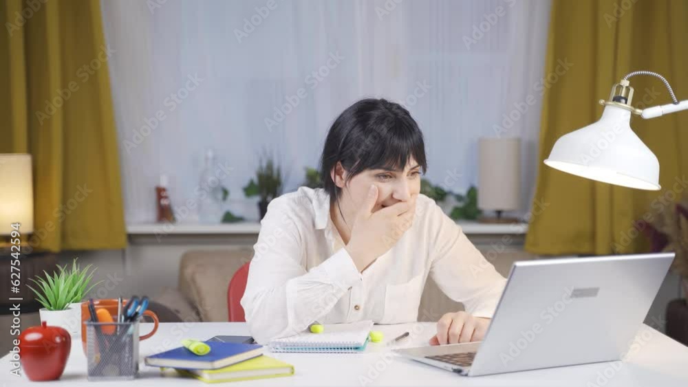 The Female student who is surprised and happy at the news. The Female student who is surprised and happy at the news.