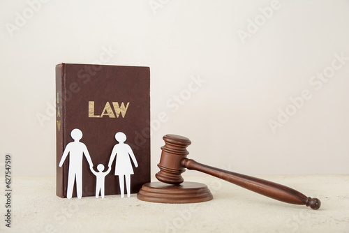 Figures of family with judg...