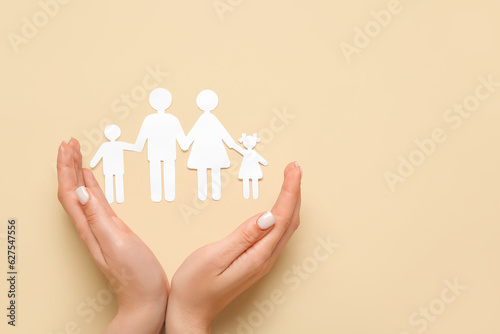 Female hands with figures o...